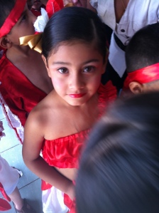 Sweet picture of Luz Dayana ready to do a dance at the Father's Day presentation